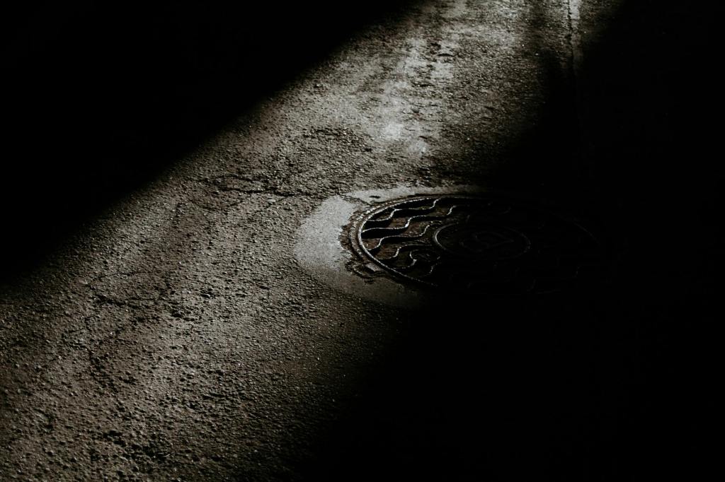 Advent Poems: He Climbed Down #Poem #Poetry #Advent #Christmas #Cardinal #Humanitarian #Homeless #Manhole #Light&nbsp;#MichaelStalcup